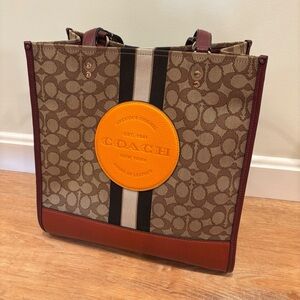 Coach Dempsey Tan and Orange Signature Tote